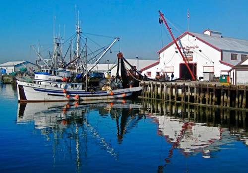 ISTRA fishing boat in front of the outbuildings of the Gulf of Georgia Cannery